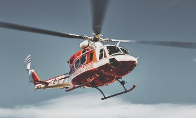 美女视频安全风险识别指南封面，红色警示图标与安全盾牌图形在深色背景上